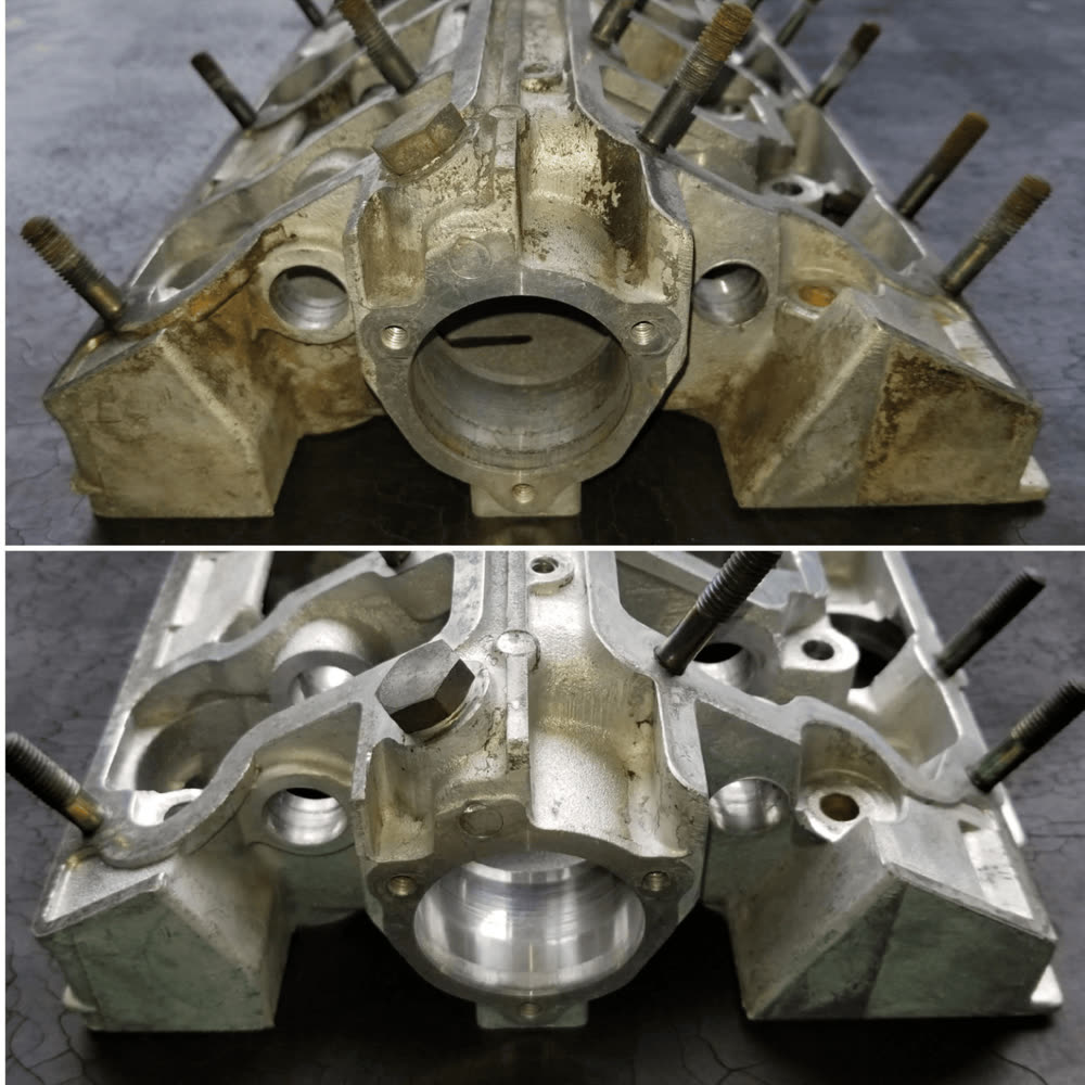 Cast aluminum intake manifold, grease and oxidation removed